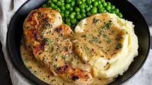 Creamy Ranch Chicken Served With Mashed Potatoes and Peas