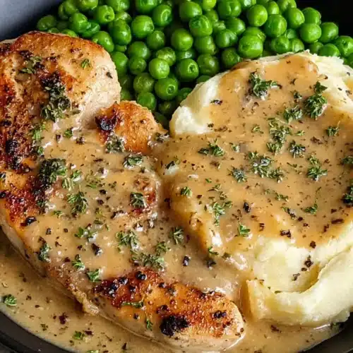Creamy Ranch Chicken Served With Mashed Potatoes and Peas