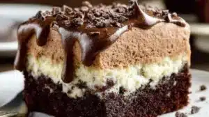 Delicious Chocolate Italian Love Cake served on a plate with chocolate drizzle