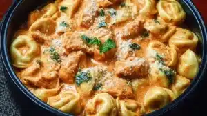 Delicious CrockPot Chicken Tortellini in a creamy sauce with vegetables
