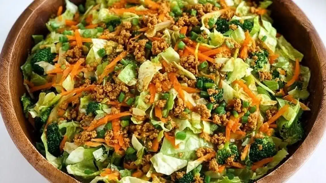 Delicious Egg Roll Salad in a bowl with fresh vegetables and toppings