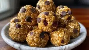 Delicious no-bake peanut butter energy bites on a wooden table