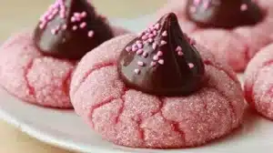 Strawberry Kiss Cookies (Soft, Pretty & So Easy!) Freshly baked Strawberry Kiss Cookies with a strawberry on top