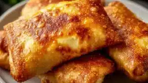 Delicious beef and cheese chimichangas served with salsa