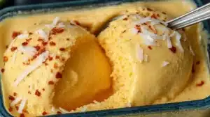 Chili Lime Mango Sorbet in a bowl garnished with lime slices