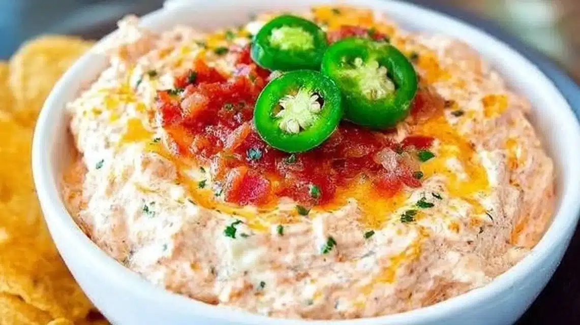 Cream Cheese Rotel Dip served in a bowl with tortilla chips