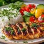Delicious and healthy grilled chicken plate with vegetables and spices