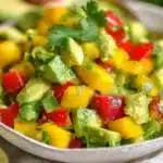 Delicious Mango Avocado Salad with fresh ingredients and vibrant colors.