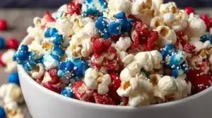 Patriotic Popcorn for Simple Summer Party Treats Colorful Patriotic Popcorn in a bowl for festive celebrations
