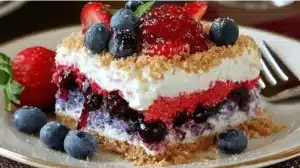A refreshing Red White & Blue Mixed Berry dessert topped with blueberries and strawberries.