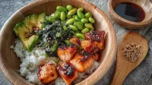 Delicious gluten-free teriyaki salmon sushi bowl with fresh ingredients