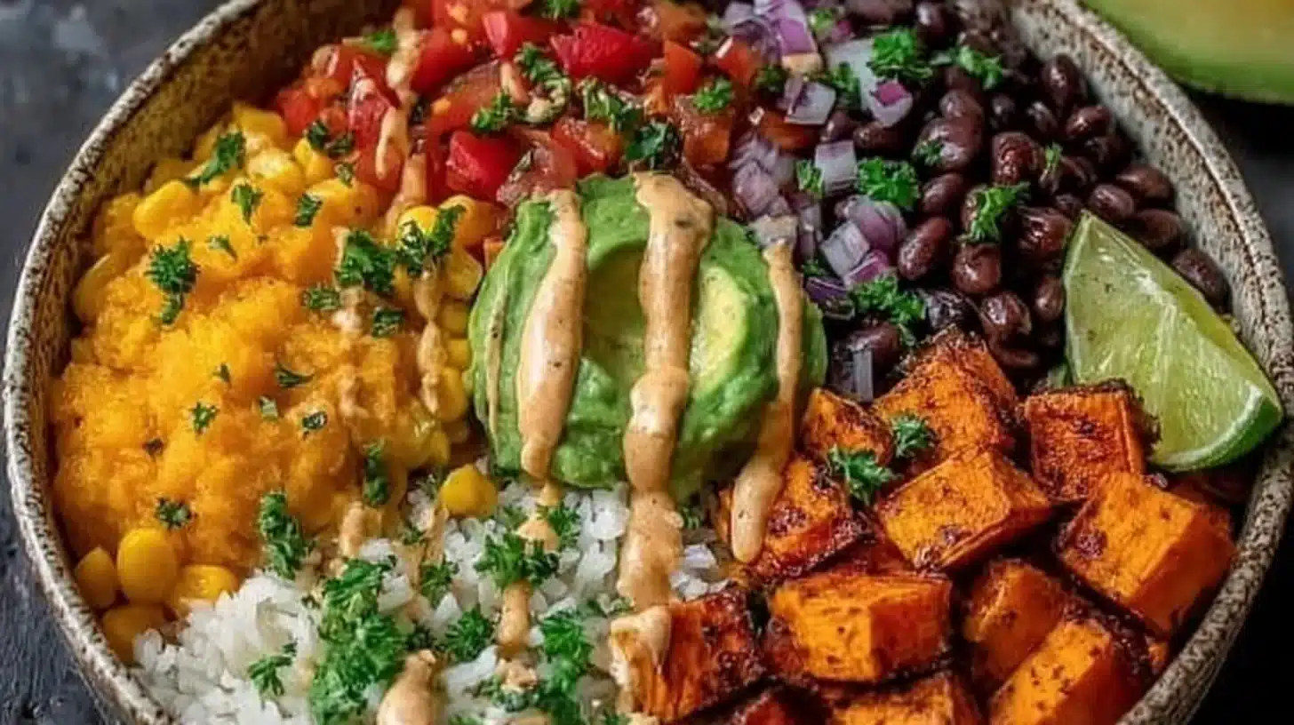 Easy Vegan Sweet Potato Burrito Bowl Everyone Will Love 1 Vegan sweet potato burrito bowl with fresh ingredients and vibrant toppings