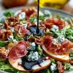Crisp pear prosciutto salad with baby arugula and walnuts